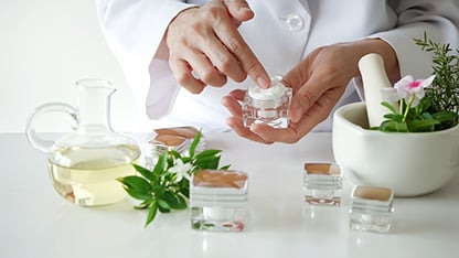 scientist testing cosmetics